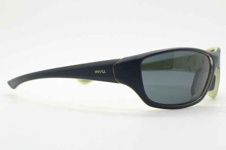 Y2K vintage sport shield sunglasses. All matt black wraparound aerodynamic visor with light green outline. 2000's. 90s. Unused NOS