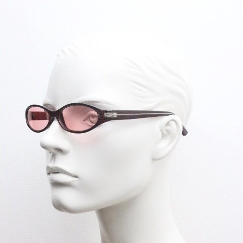 90s vintage abstract oval sunglasses. Thick curve around pink frame with psychedelic light pink lenses. Super villain mini mask. Cosplay NOS