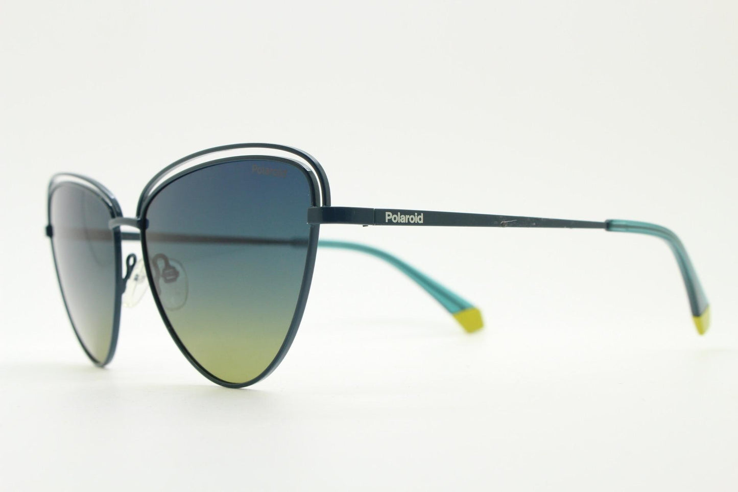 Polaroid vintage rounded cat eye sunglasses. Metal double brow frame with sensational blue to yellow graduating lenses. Unused NOS