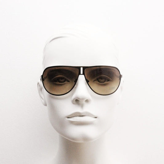 Storm Y2K bug eye aviator sunglasses model Photon. Bronze satin finish shield style aviators with graduating brown lenses.  Unused NOS.