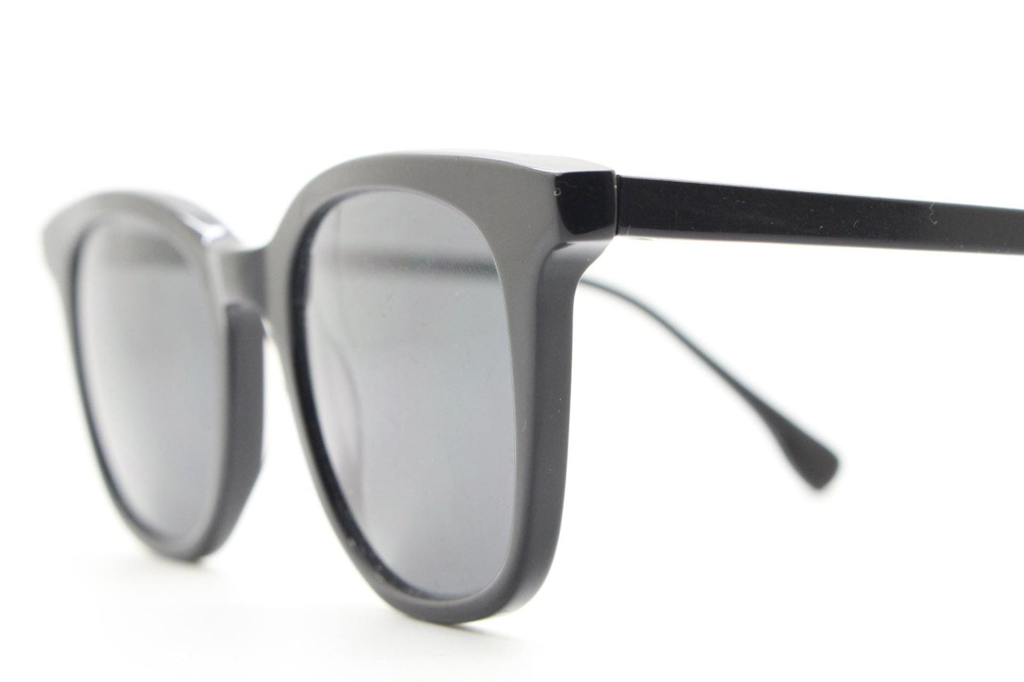 Vintage 90s slim frame black horn rim sunglasses. All time classic retro refined wayfarer design in gloss with black lenses