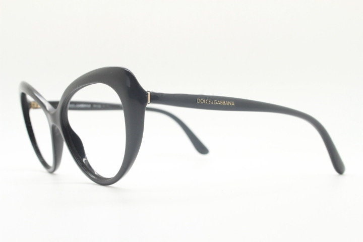 Dolce Gabbana oval cat eye glasses made in Italy. Stylised black gloss acetate optical frames. Womens prescription vintage cateye. RX pin up