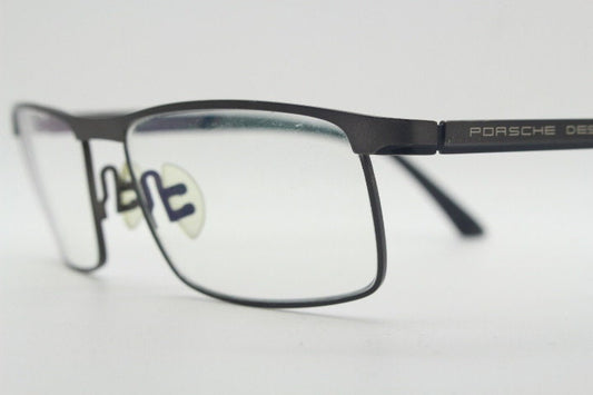 Porsche design rectangular eye glasses model 8251 made in Japan. Minimal gunmetal grey wire optical frame. Prescription RX spectacles