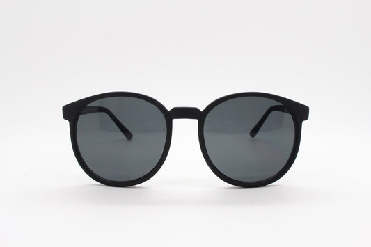 80s vintage round sunglasses. Slightly oversized slim black frame in a rubber finish with matching lenses. Unworn. BNWT