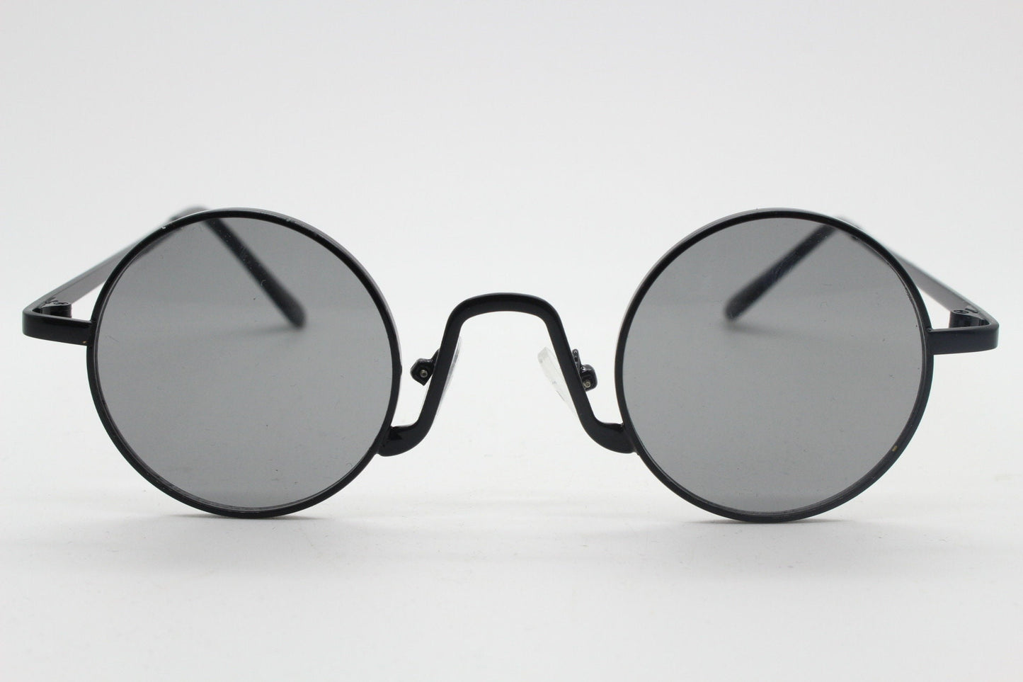 90s vintage small oval sunglasses. Imposing minimal black victorian style frame with dark grey lenses. Steampunk. Unused BNWT