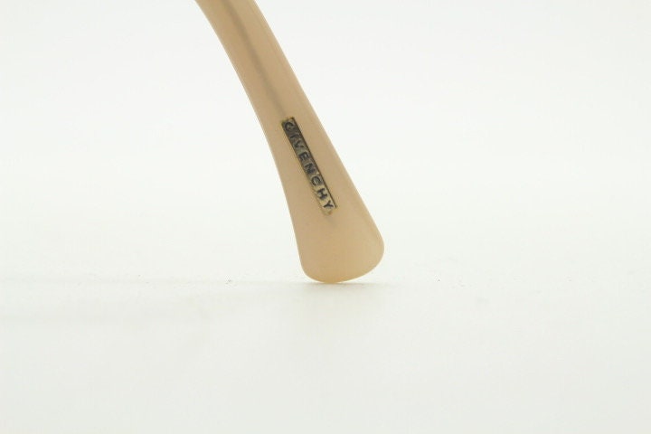 Givenchy eye glasses in brown chrome with beige acetate arms and gold diamante detail. Rhinestone optical frames. Prescription eyeglasses RX