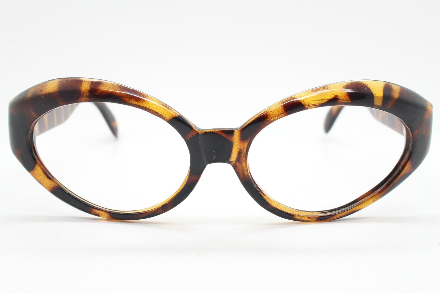 80s vintage oval cat eye glasses. Crop sided dynamic tortoise cateye optical frames. 60s style prescription eyeglasses. RX spectacles. NOS