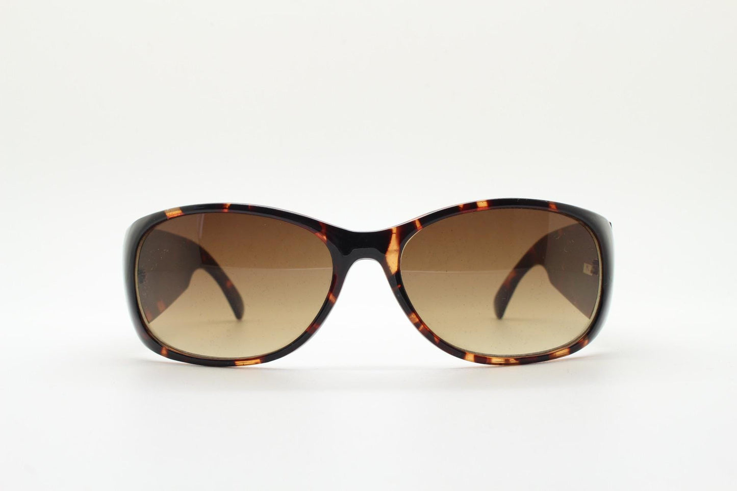 Y2k vintage wrap around bug eye sunglasses. Aerodynamic 60s design tortoise frame with full height arms in excellent proportions. 2000's NOS