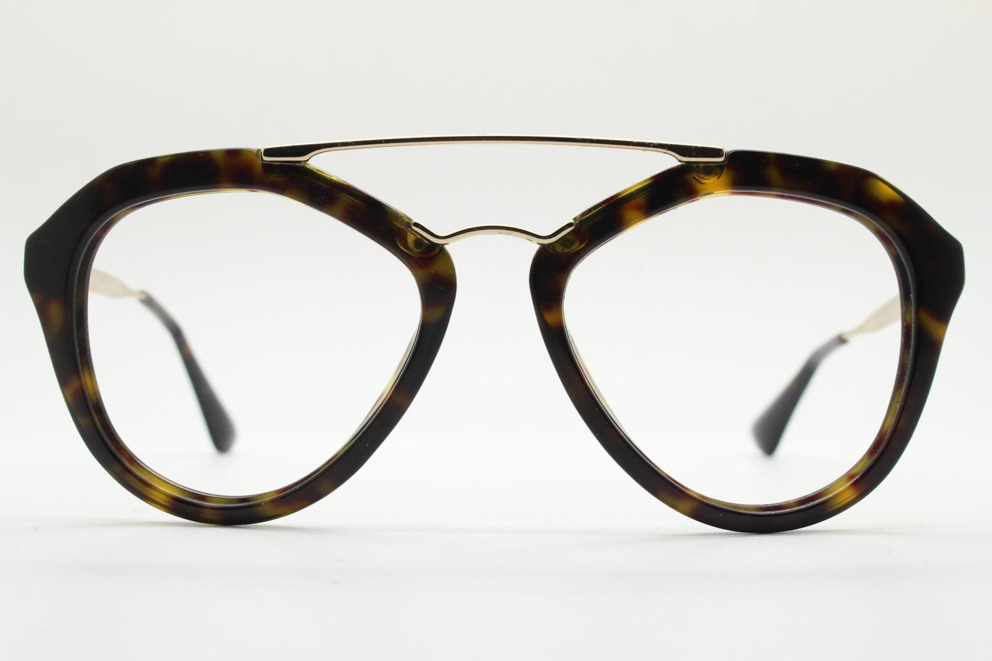 Prada angular eye glasses made in Italy. Thick tortoise acetate optical frames with prominent gold double bridge. Prescription. RX