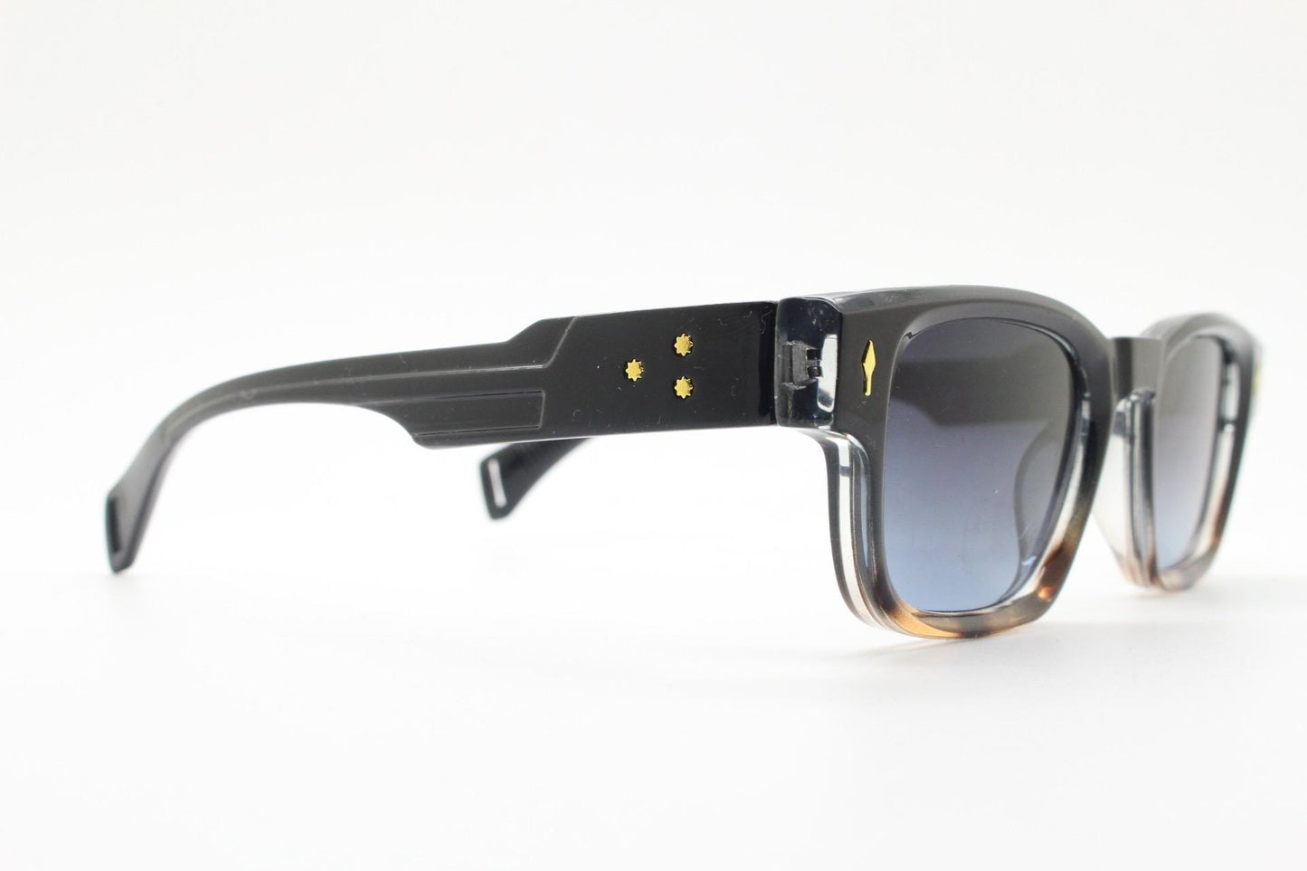 Vintage 90s low profile thick frame sunglasses. Black and tortoise ombre frame with graduating grey lenses. Unused NOS. One off sample