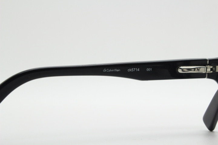 Calvin Klein rectangular glasses model 5714. Black gloss low profile acetate optical frames. Prescription eyeglasses. RX vintage spectacles