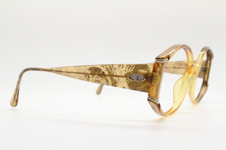 Christian Dior 70s vintage round eye glasses. Transparent honey colour optical frame with abstract gold sparkle patterns. Prescription RX