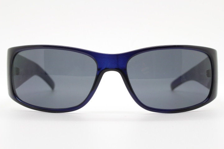 Assoluto 90s vintage wrap around rhinestone shield sunglasses made in Italy. Deep blue acetate frame with dazzling diamante circles. NOS