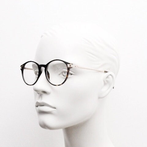 90s vintage round glasses with tortoise front and gold embossed arms. 40s, 50s style prescription optical frames. Clear lens eyeglasses. RX