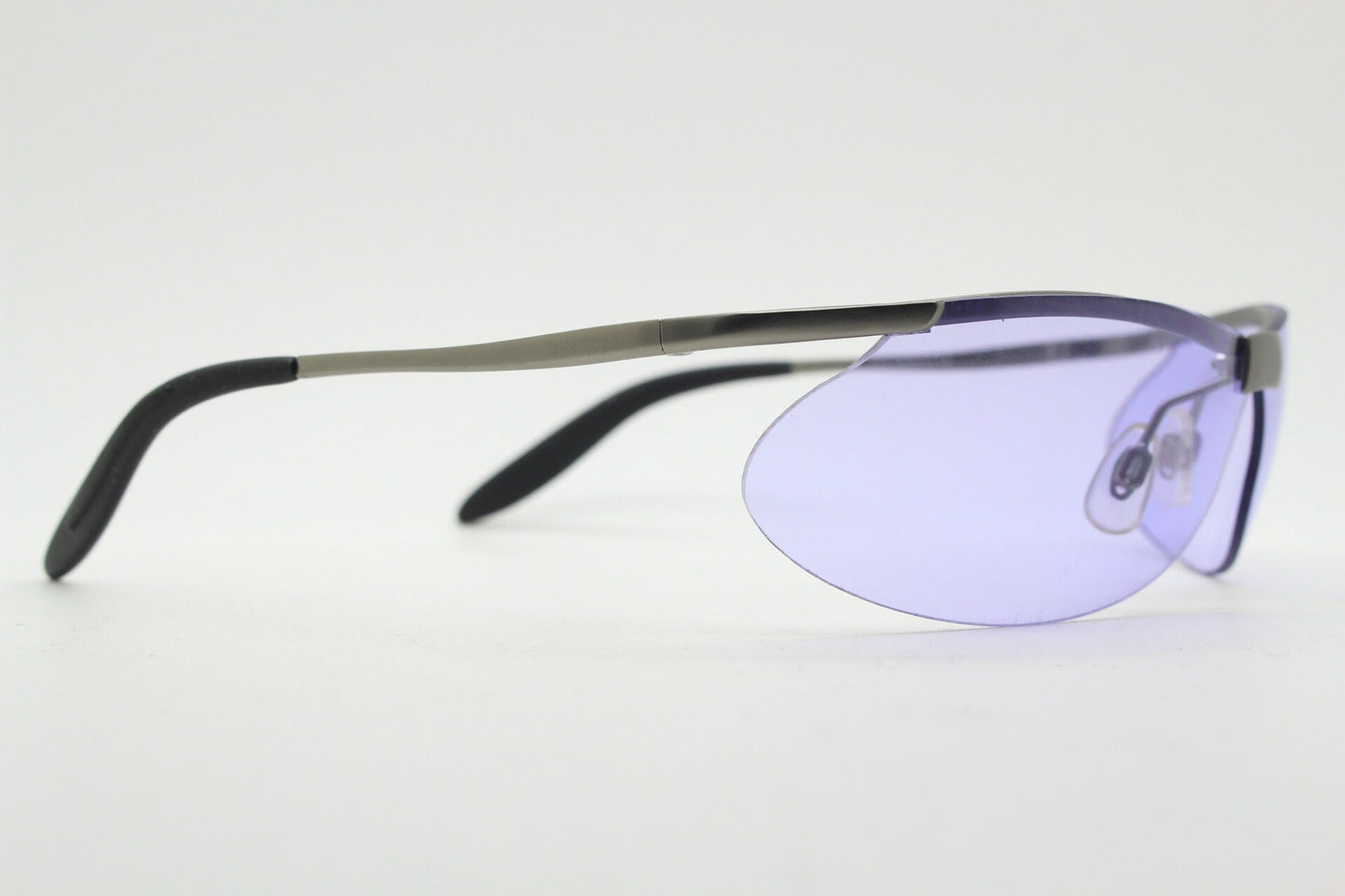 Y2K vintage sport shield sunglasses. 2000's half frame wraparound aerodynamic mini mask visor with purple bug eye lenses. 90s 00s unused NOS