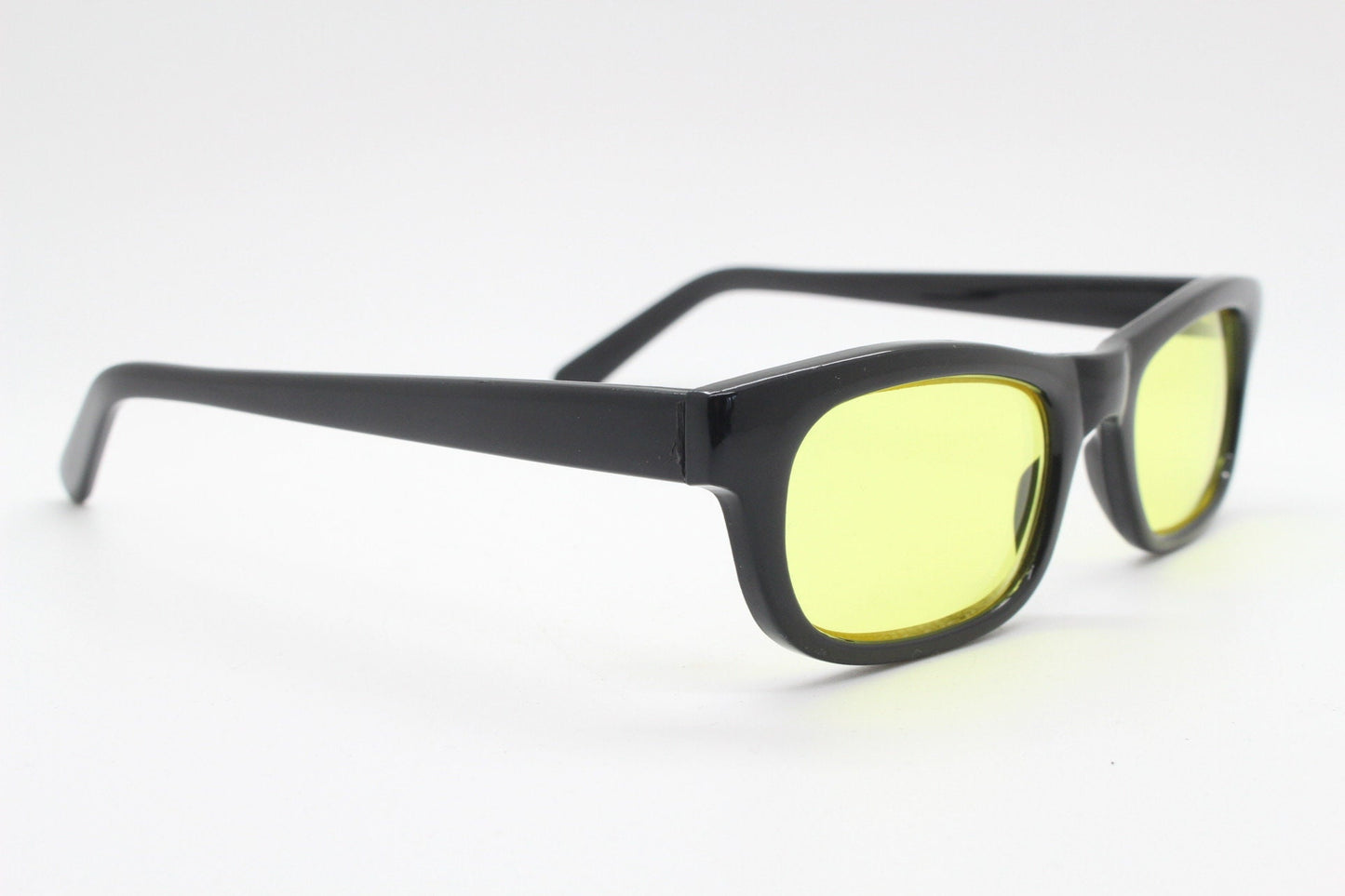 80s vintage rectangular sunglasses. Low profile slim black frame with psychedelic mod light tone canary yellow lenses. BNWT. NOS
