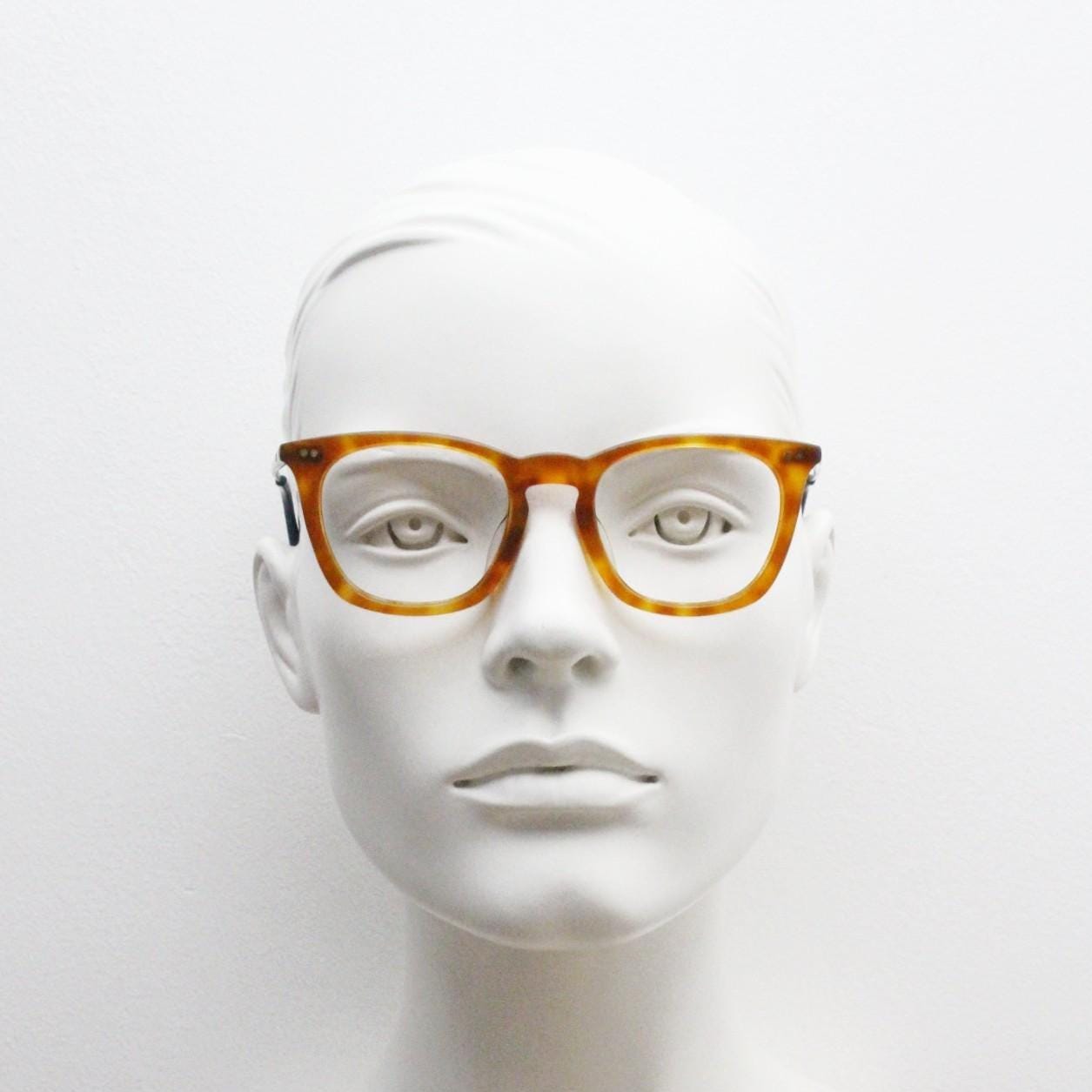 Tom's rectangular horn rim eye glasses. Classical 40s design in amber acetate with gold arms. Prescription optical frames. RX spectacles