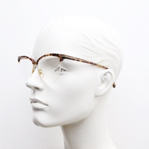 Versace 90s vintage brow line cat eye glasses made in Italy. Elegant tortoise acetate cateye optical half frames. Prescription RX eyeglasses