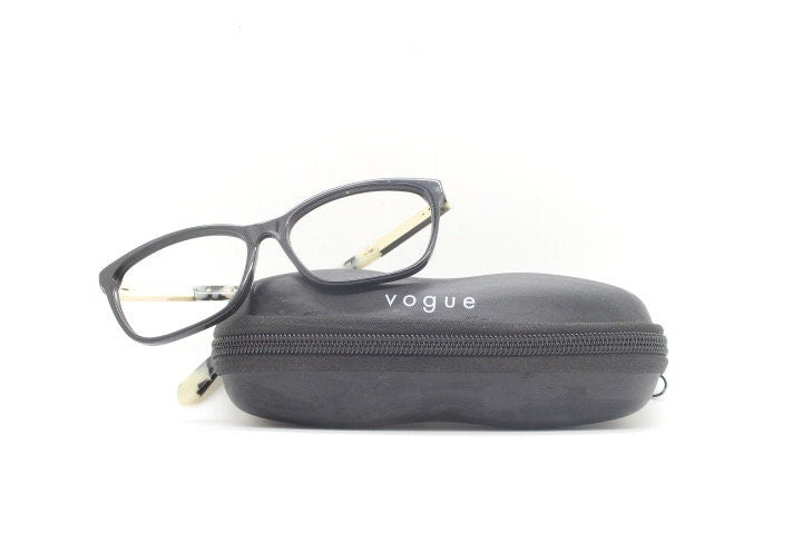 Vogue womens oval eye glasses model 5223. Black acetate optical frames with metal arms. Prescription eyeglasses. RX spectacles