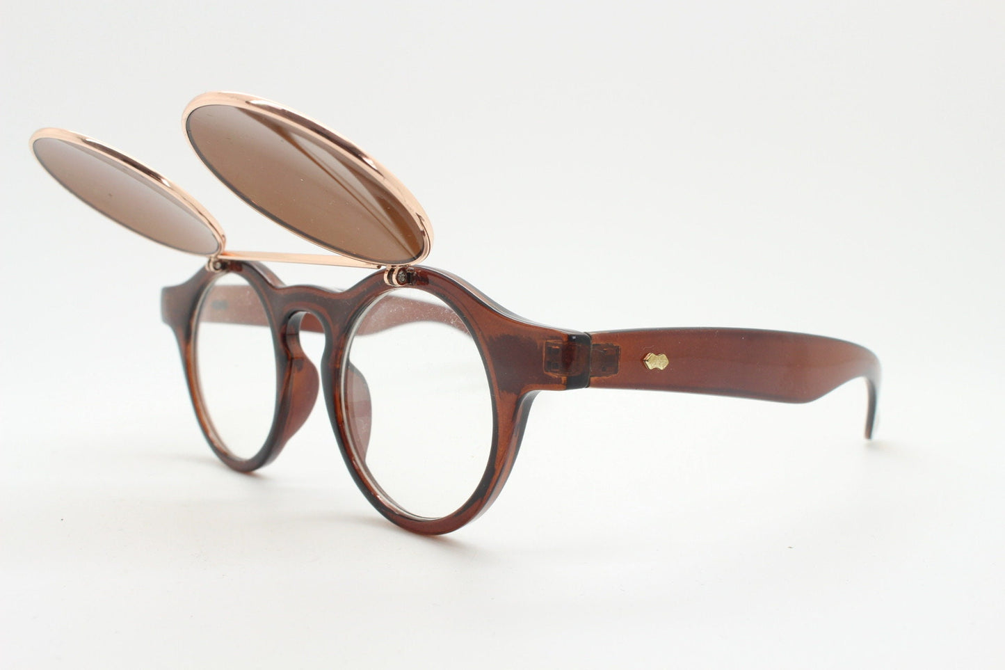 Vintage 90s round flipper sunglasses. 30s style brown frame with clear lenses and flip up sunglasses visor. BNWT unused