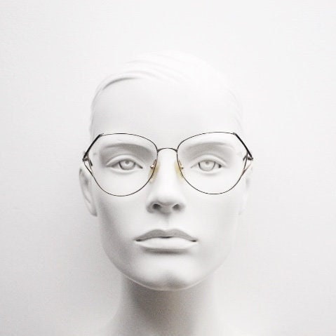 Viennaline 70s vintage angular round eye glasses. Slightly oversized subtle gold chrome optical frame with incredible arms. Prescription RX