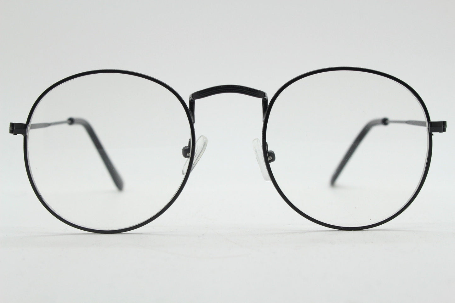 90s vintage round metal glasses. Classic 60s panto design black frame with clear lenses in excellent proportions. Unused NOS eyeglasses