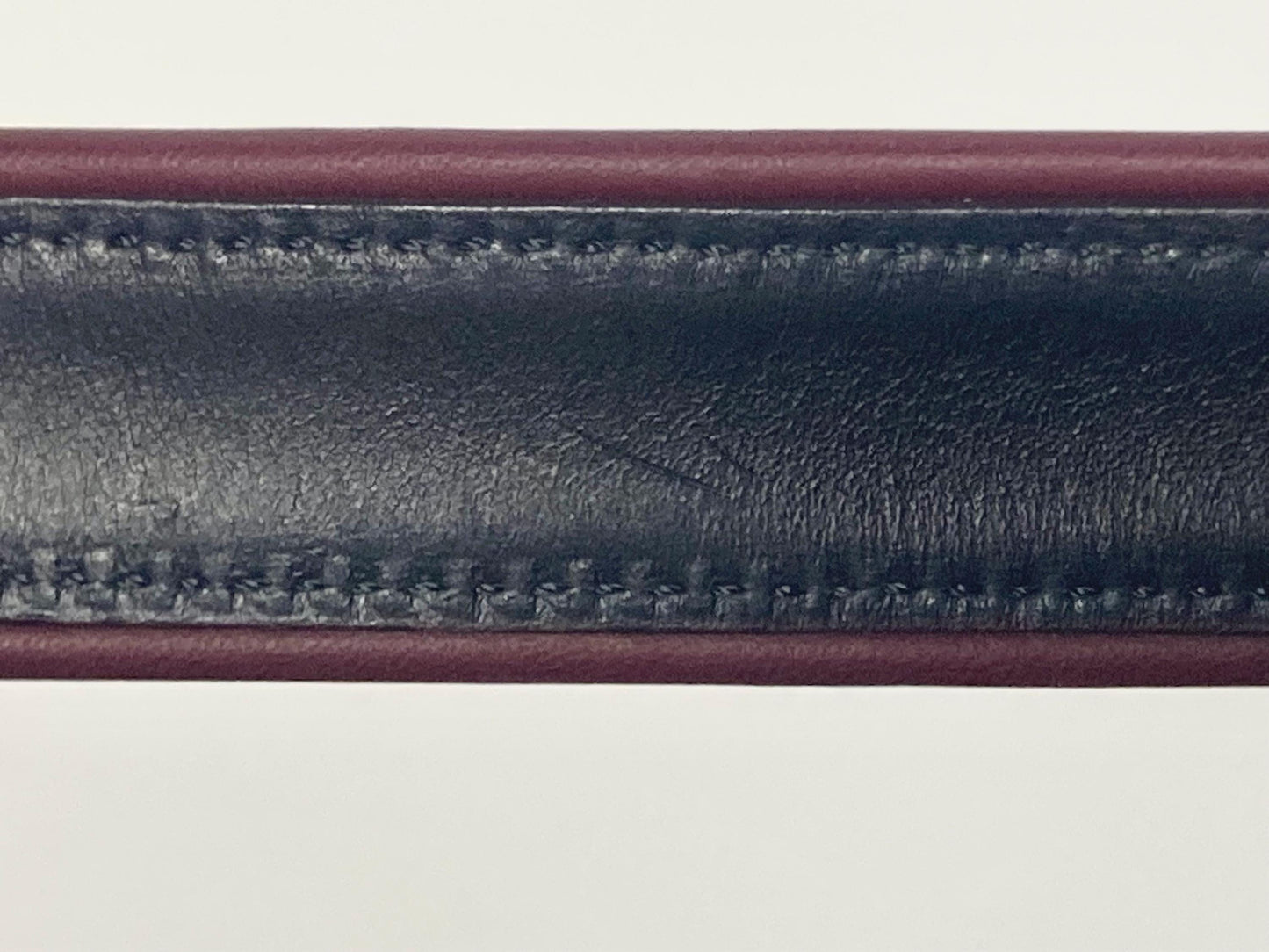 Moschino 90s vintage womens dress belt in oxblood and blue genuine leather with oval enamelled metal buckle. Made in Italy. BNWT. NOS