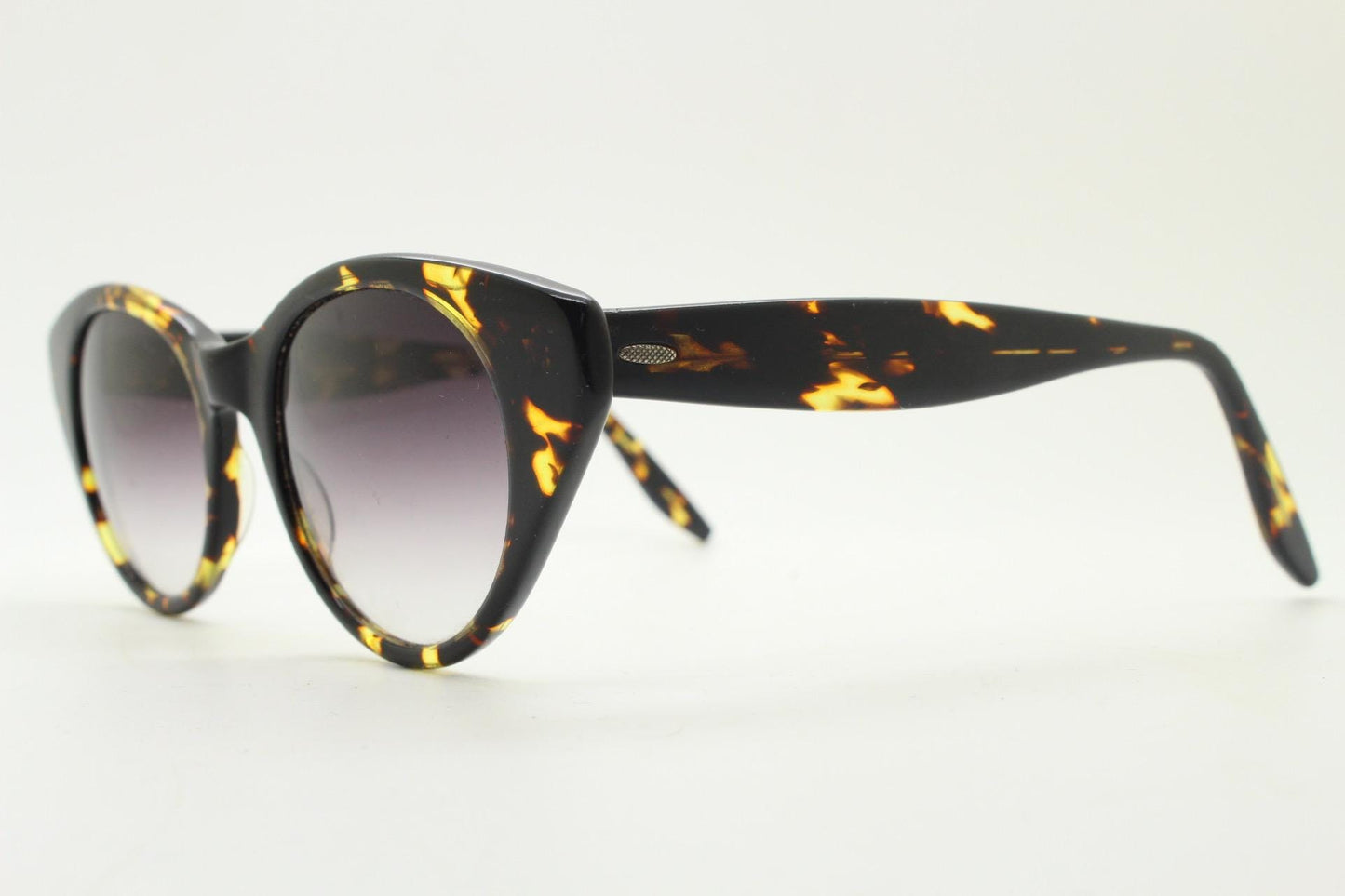 Barton Perreira subtle cat eye sunglasses model kismet. Honey tortoise acetate frame with cropped sides and graduating lenses