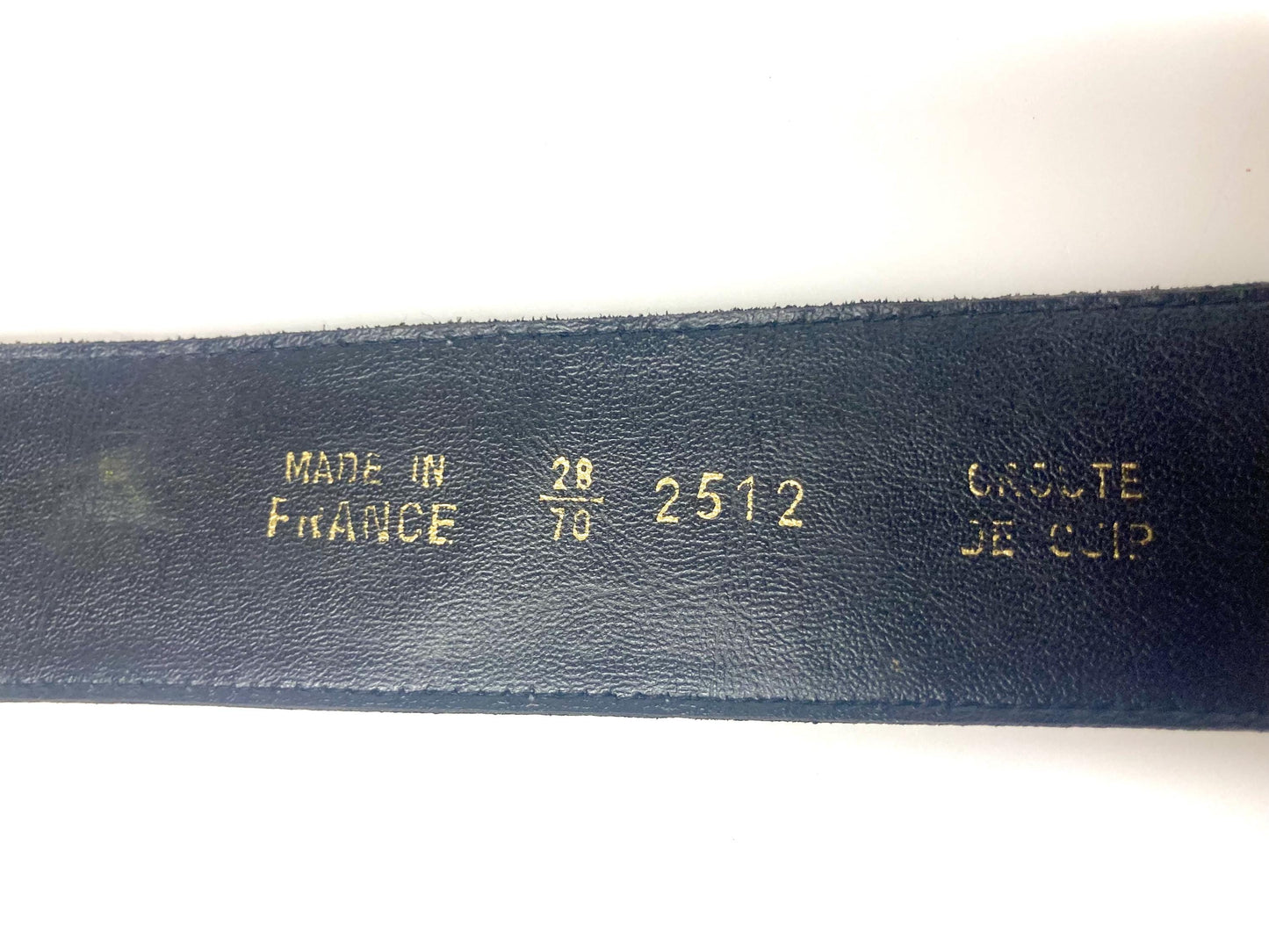 80s vintage womens dress belt in navy blue genuine leather with substantial gold chrome studded 'H' motifs. Made in France. Size S