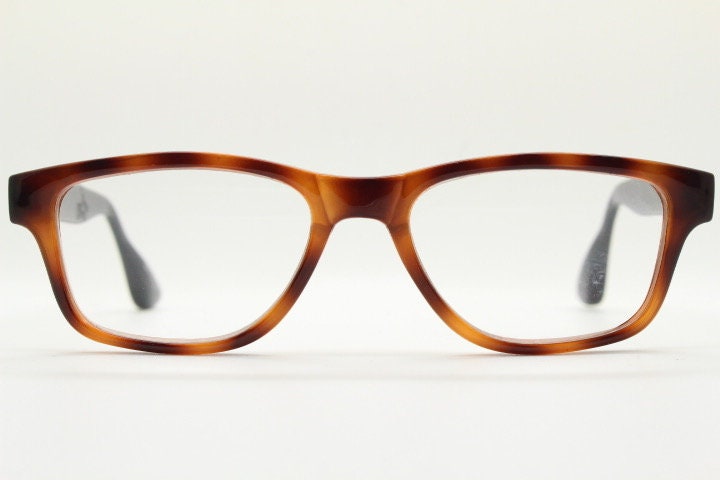 Isaac Mizrahi vintage rectangular eye glasses. Tortoise optical frames with contrasting black arms. Prescription RX. NOS spectacles
