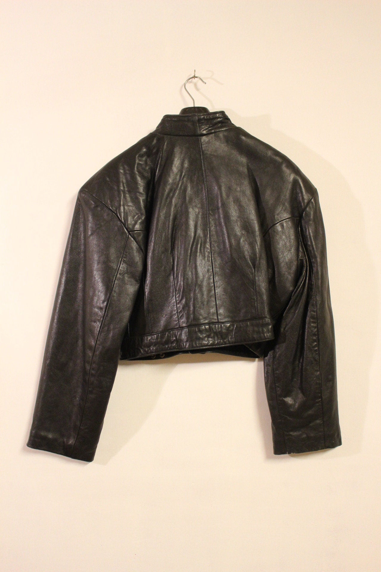 Hi-Tech 90s vintage black leather jacket. Made in England. Cropped oversized blouson design. Double breasted with chrome metal
