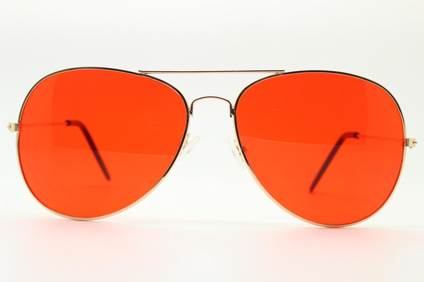 Y2K vintage teardrop aviator sunglasses. Gold chrome metal frame 70s design aviators with intense red lenses. 2000s. Unused NOS
