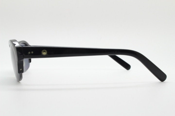 Stylised vintage oval praying mantis cateye sunglasses made in Japan. Superior Japanese black gloss acetate half frame bug eye