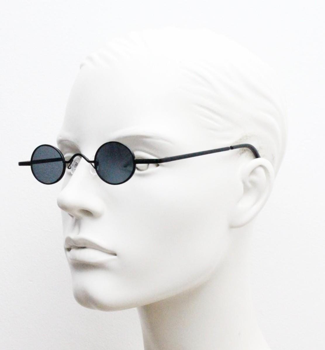 90s vintage small oval sunglasses. Imposing minimal black gloss metal victorian style frame. Steampunk. Unused BNWT