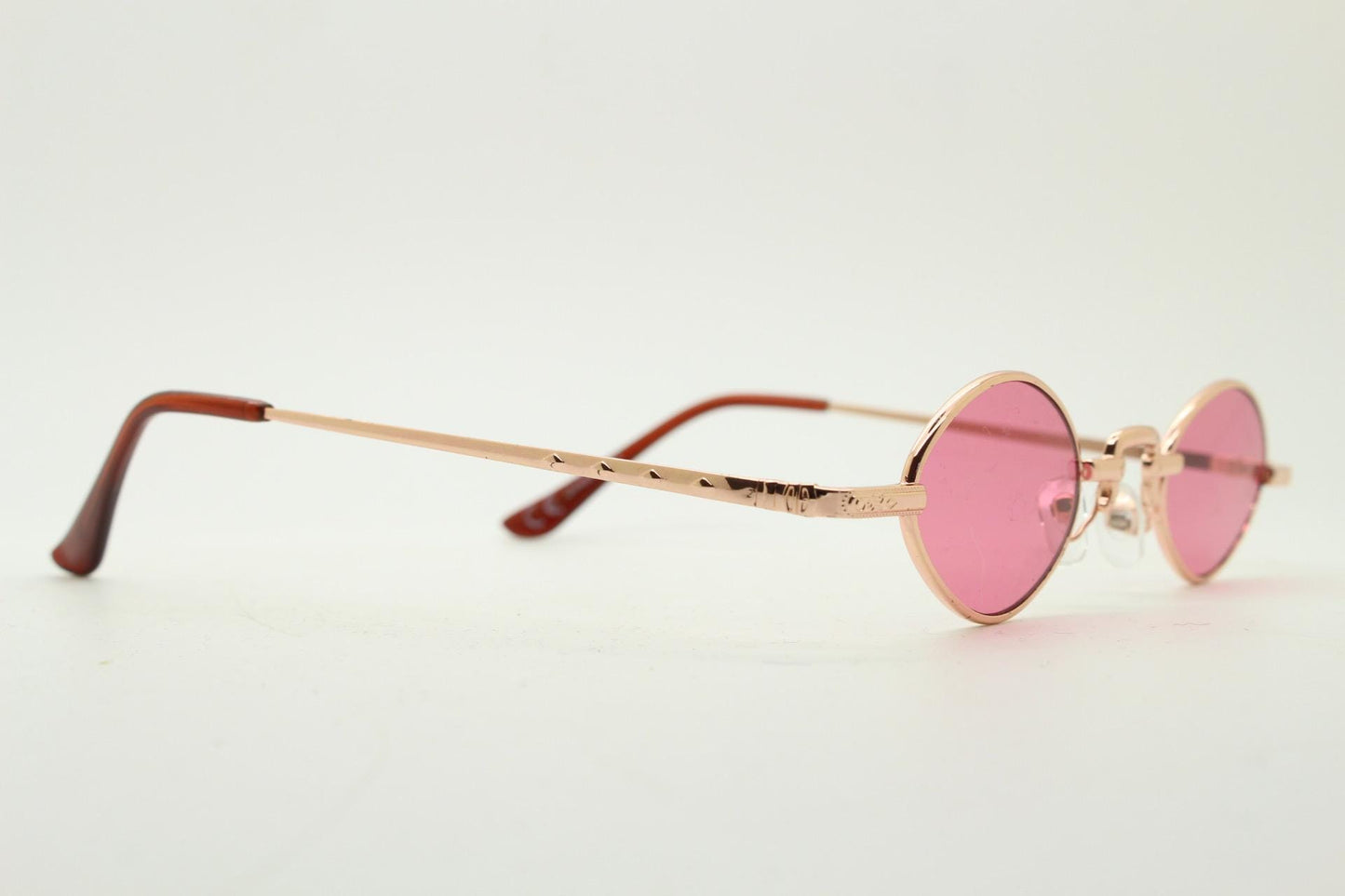 90s vintage small oval sunglasses. Imposing minimal rose gold metal victorian style frame with shocking pink lenses. Steampunk. BNWT