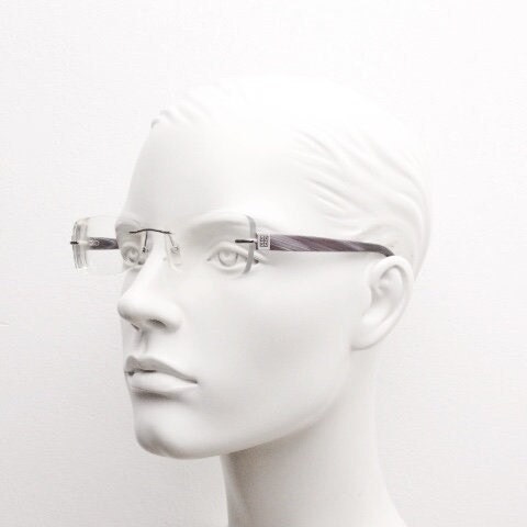 Givenchy rectangular frameless eye glasses made in Italy. Minimal optical frame with marbled brown arms. Prescription RX spectacles. Vintage