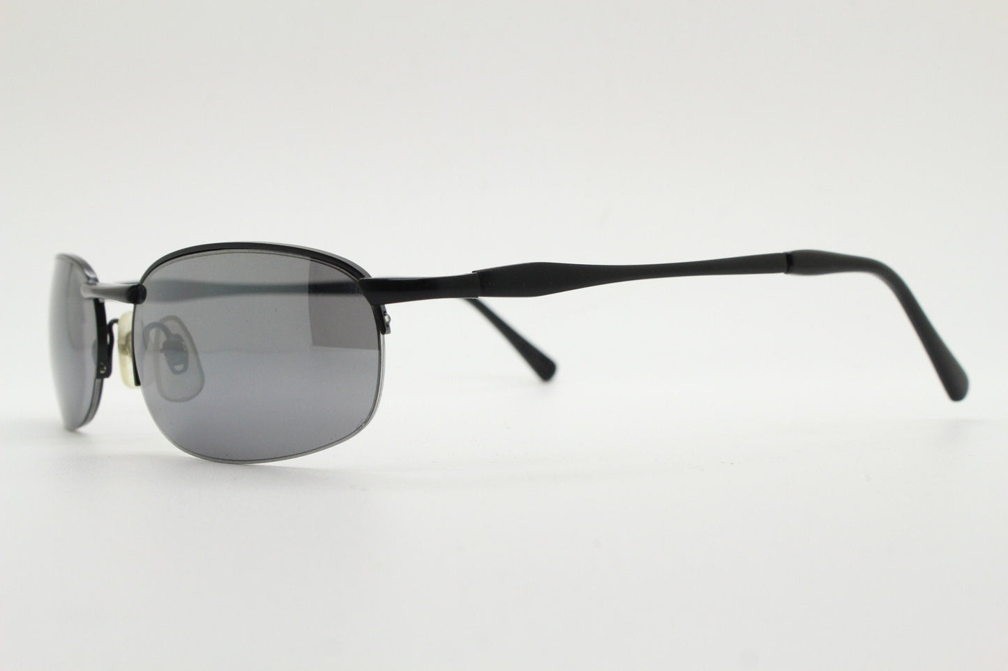 90s vintage small oval black sunglasses. Satin finish half frame with grey lenses and slight mirror glaze. 2000's. Y2K. Unused NOS