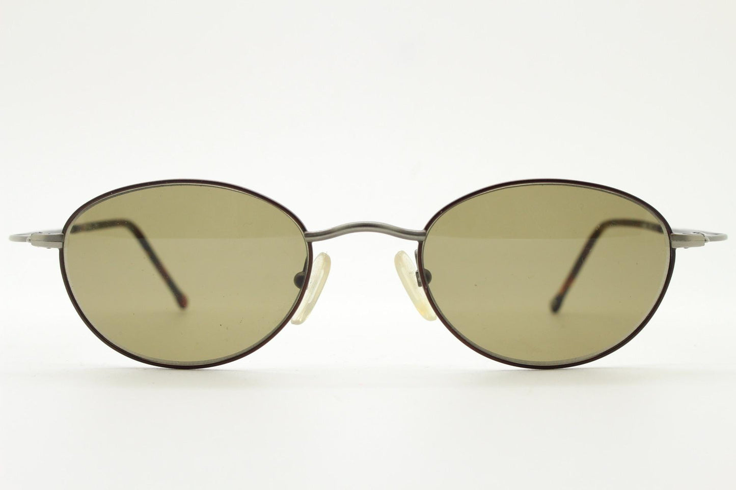 90s oval vintage metal sunglasses. Minimal satin finish bronze and brown metal frame with kinked curving arms. Steampunk. Unused NOS