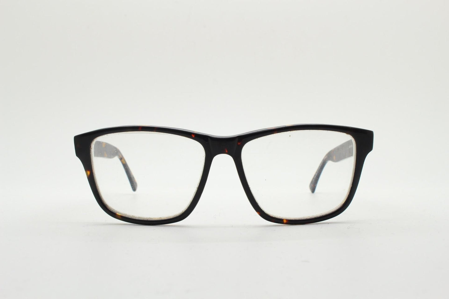 Cheap Monday rectangular low profile eye glasses. Dark brown tortoise gloss finish acetate optical frames. Prescription RX spectacles