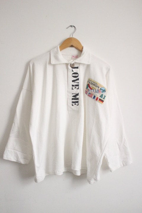 80s Vintage oversized polo shirt with 'LOVE ME' graphic print. Crop sleeve jumper. Unisex sweatshirt. Fashion grail sweater. NOS pullover