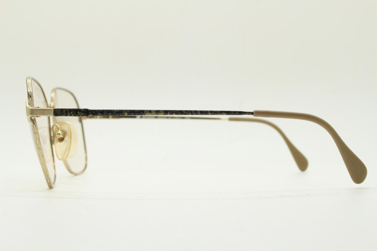 80s vintage square eye glasses made in Italy by Studio. Black and gold patterned metal optical frames in neat proportions. Unused NOS