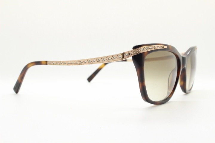 Borsalino cat eye sunglasses made in Italy model 250. Womens Tortoise acetate frame with dramatic diamante golden arms. Rhinestone cateye