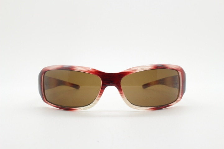 Vintage rectangular shield sunglasses. Transparent abstract red tiger print low profile visor style wrap around frame. Y2K NOS. 2000s
