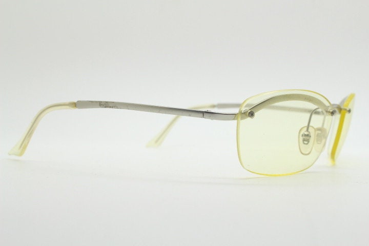 Y2K vintage half frame extra light tone yellow sunglasses with satin alloy brow line. Minimalistic 2000's wrap around design. 00's NOS