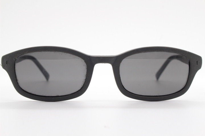 Dolce and Gabbana gum sunglasses made in Italy. Mens 90s vintage innovative flexible grey rubber frame with black lenses