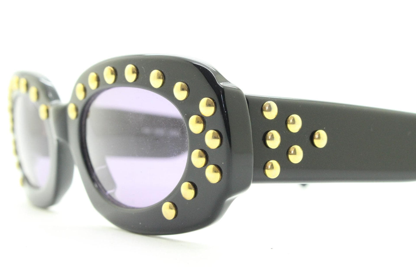 Lanvin vintage thick frame oval sunglasses with large golden dome studs. Womens 60s shape black acetate frame with atmospheric purple lenses