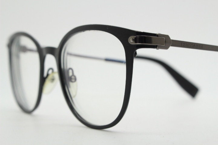 Trussardi modified cat eye glasses model VTR023. Womens flat black and gunmetal grey optical frame. Prescription. Vintage spectacles