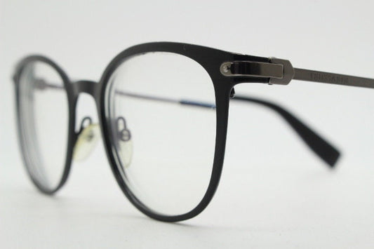 Trussardi modified cat eye glasses model VTR023. Womens flat black and gunmetal grey optical frame. Prescription. Vintage spectacles
