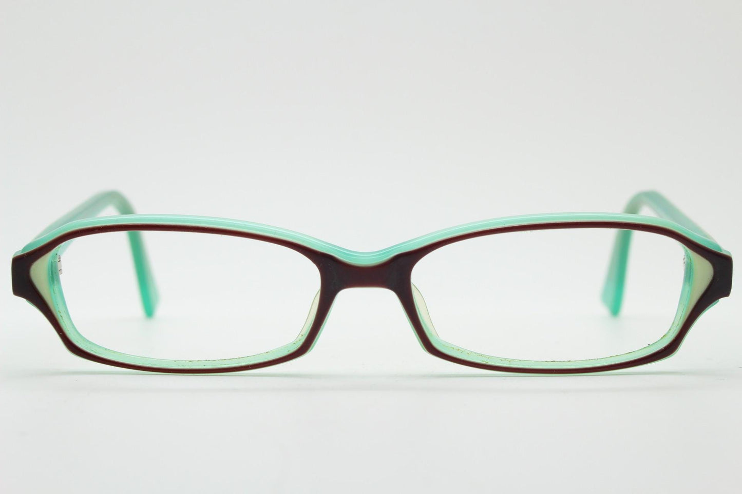 Francois Pinton Paris rectangular cat eye glasses made in Italy. Womens vibrant green acetate optical frames with brown front. Vintage