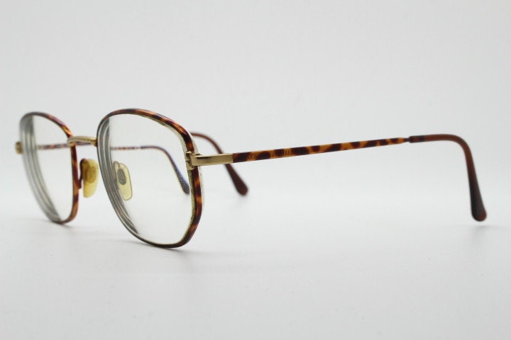 Giorgio Armani 90s vintage angular squared eye glasses made in Italy. Subtle metallic satin tiger print optical frames. Prescription RX